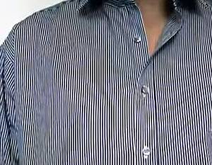 A close up of a button up shirt which depicts the Moire effect